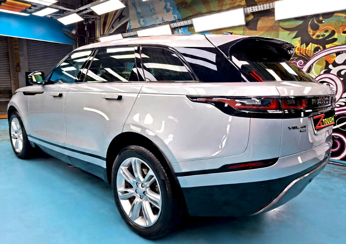The coated paintwork of the Range Rover Velar, clean and sharp.