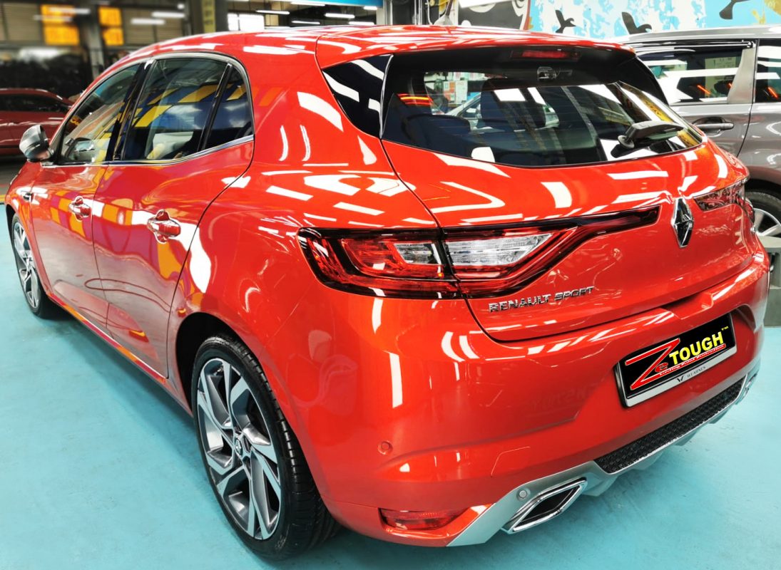 Rear quarter of the Megane, glossy and protected.