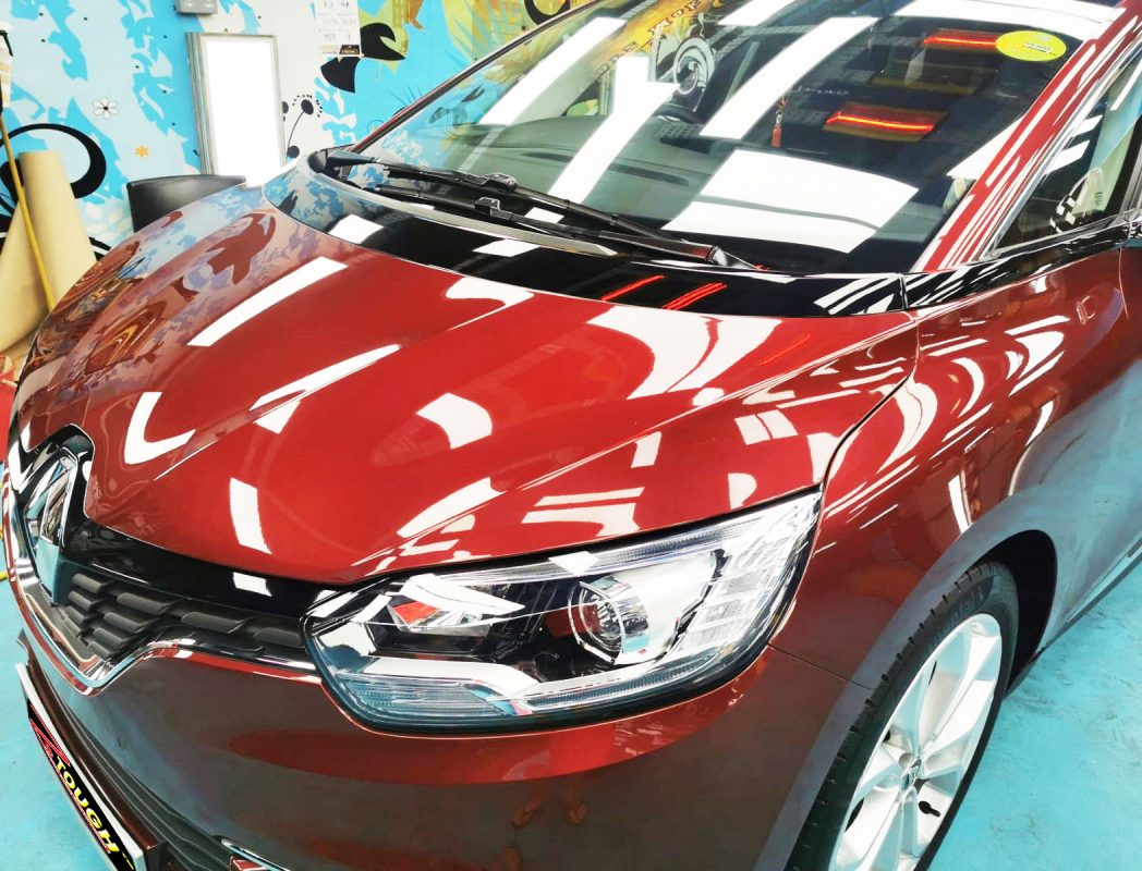 The Renault Scenic parked in the workshop, freshly coated.