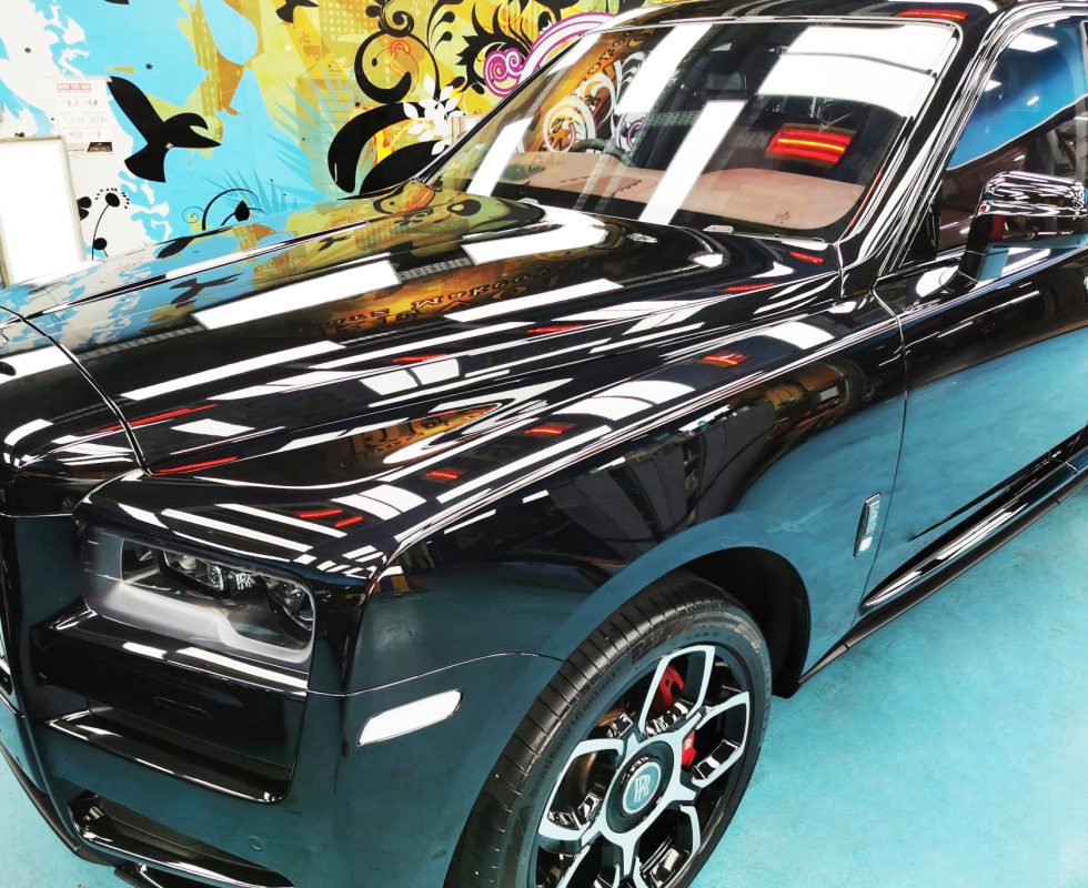 The Rolls-Royce Cullinan from a side angle after the titanium coating.