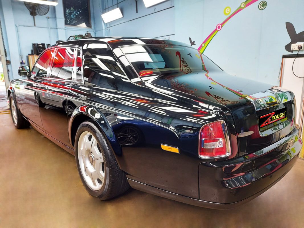 Rear quarter of the Rolls-Royce Phantom, glossy and protected.