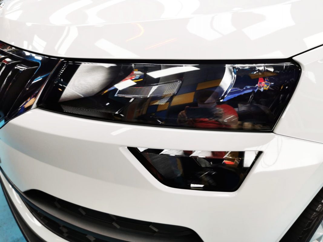 The Karoq's coated paintwork showing clean reflections.