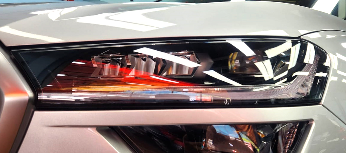 The Kodiaq's coated paintwork showing clean reflections.