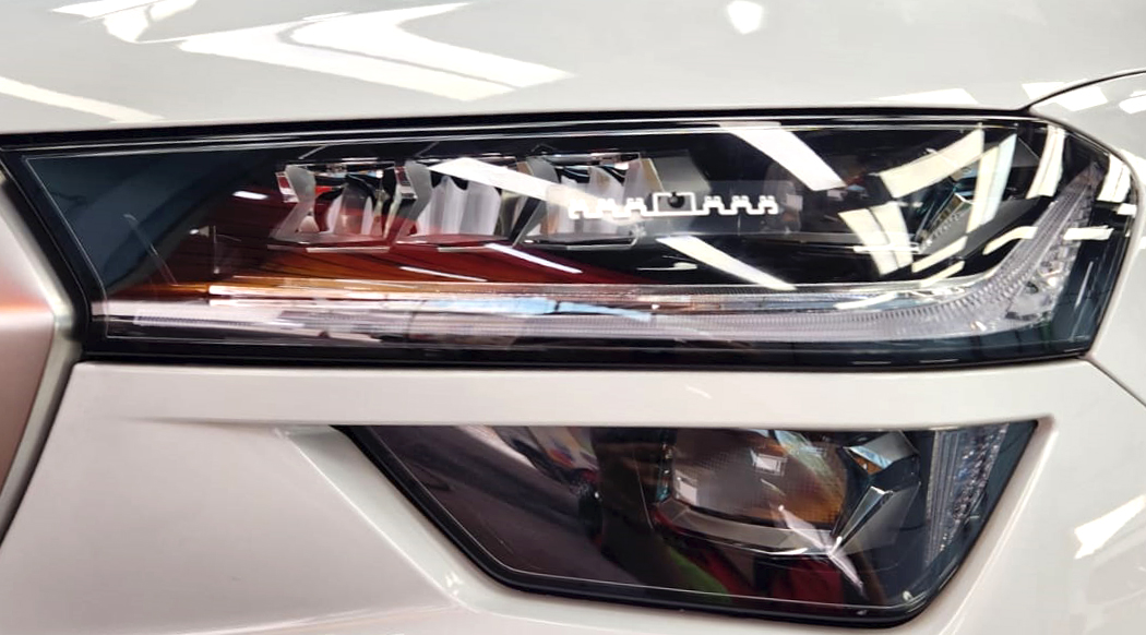 The Kodiaq's coated paintwork showing clean reflections.