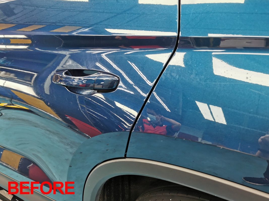 The Kodiaq's coated paintwork showing clean reflections.
