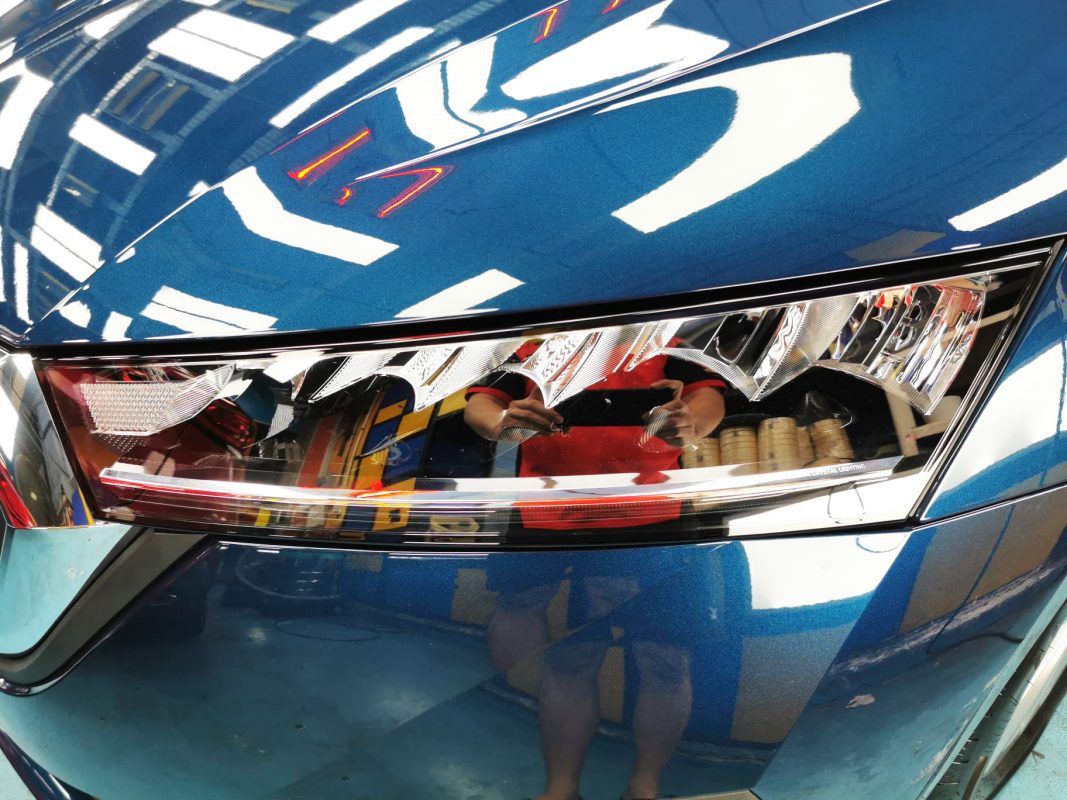 The Octavia's coated paintwork showing clean reflections.