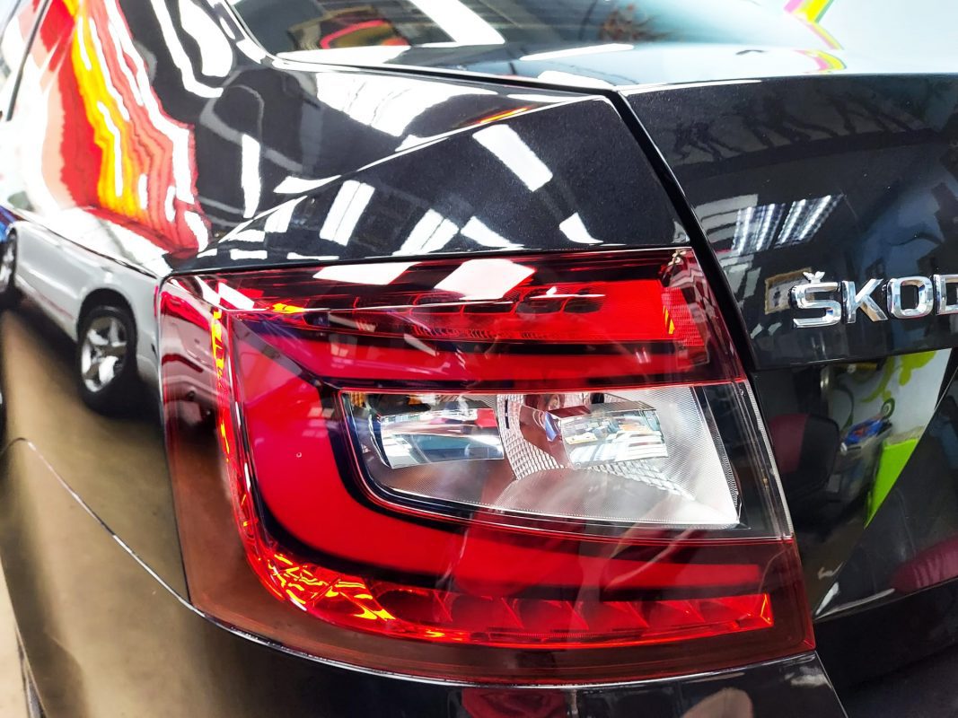 The bonnet of the Octavia under workshop lighting.