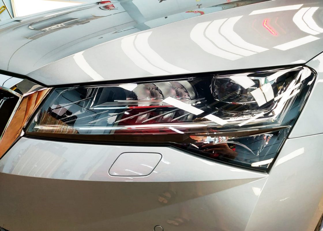 The Superb's coated paintwork showing clean reflections.