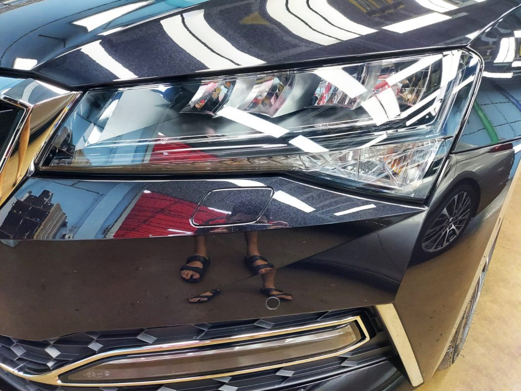The Superb's coated paintwork showing clean reflections.