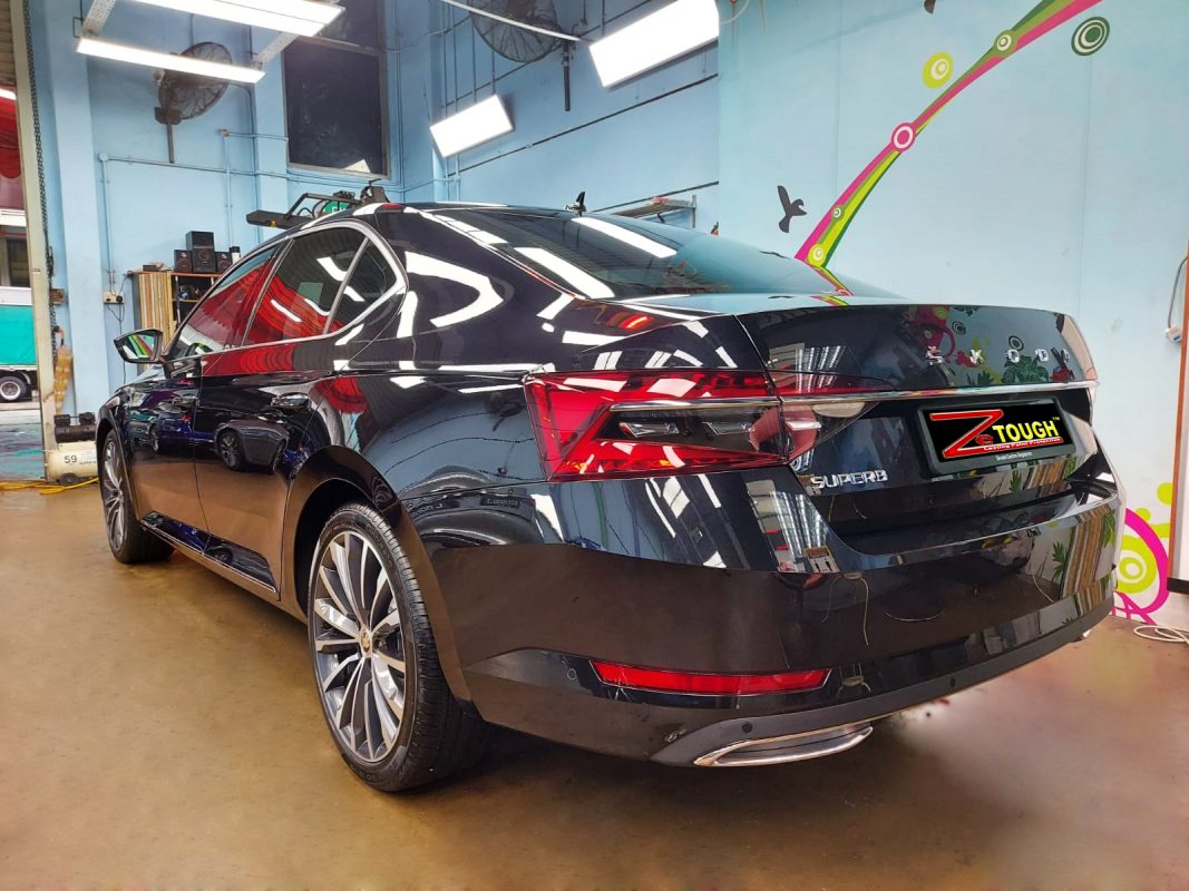 Rear quarter of the Skoda Superb, glossy and protected.