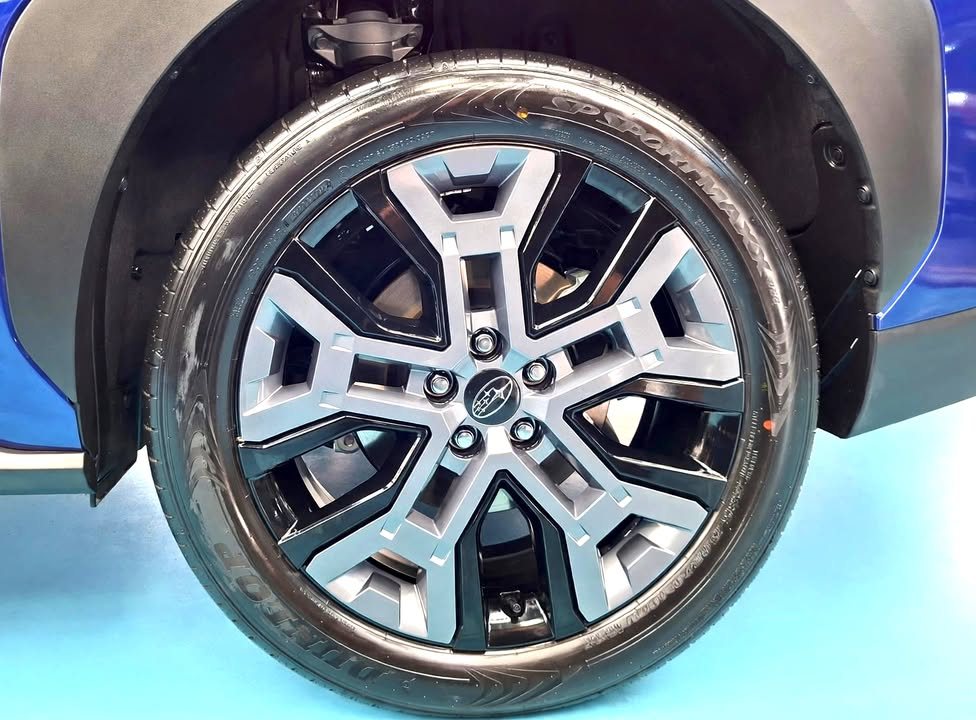 Close-up of the Subaru E-Outback two-tone alloy wheel and tyre.