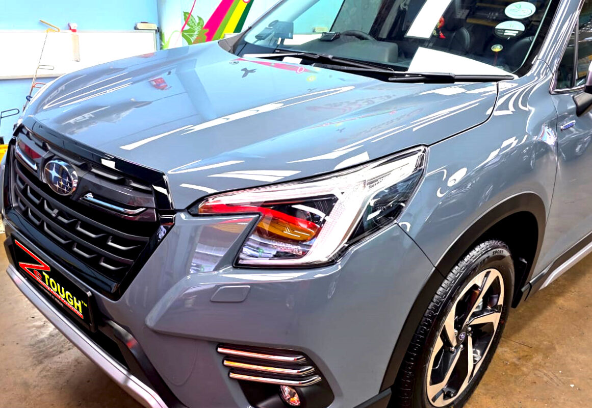 The Subaru Forester from a side angle after the titanium coating.