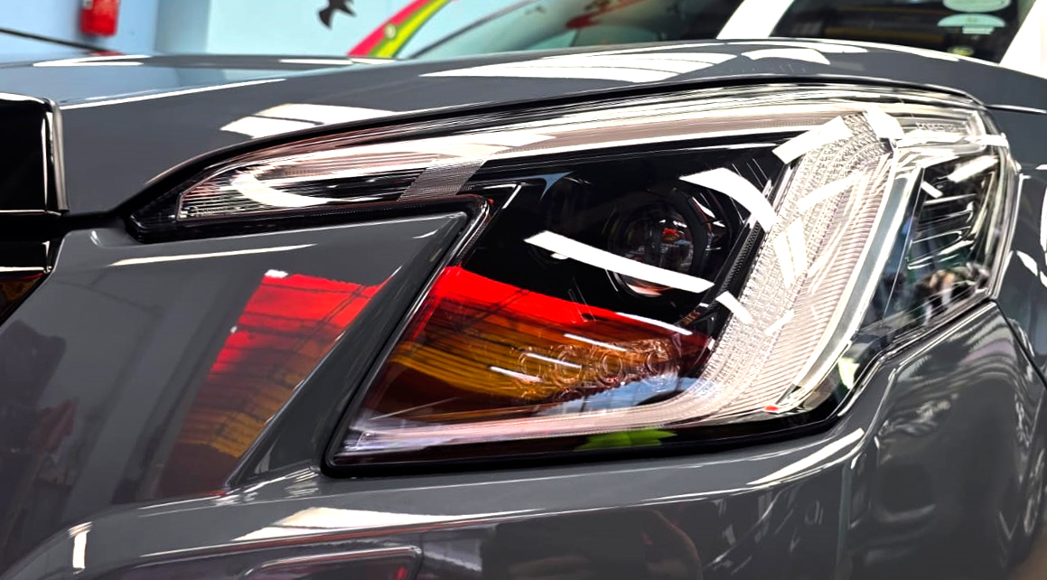 The Forester's coated paintwork showing clean reflections.