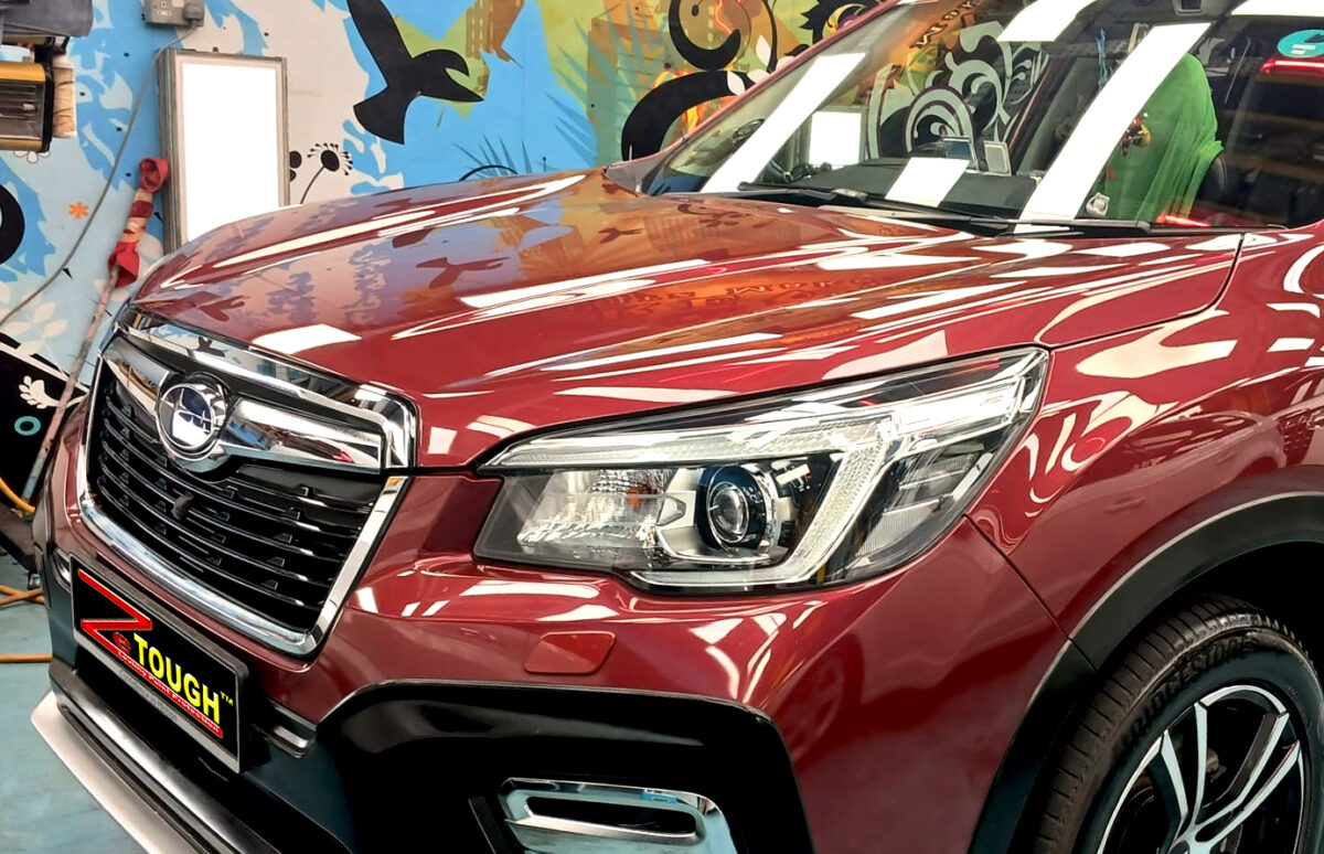 The Subaru Forester from a side angle after the titanium coating.