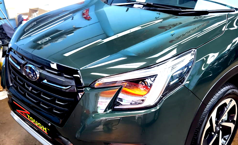 The Subaru Forester from a side angle after the titanium coating.