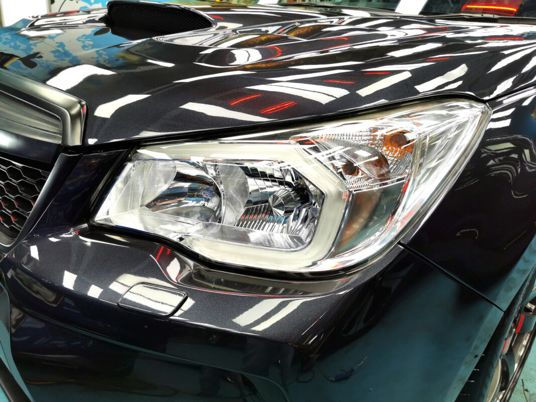 Before: the Subaru Forester's paintwork as it arrived, worn and damaged.