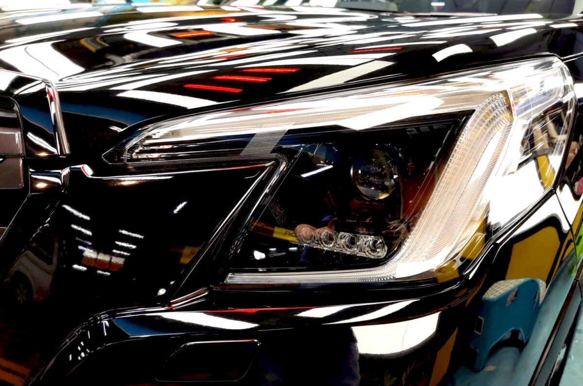 The Forester's coated paintwork showing clean reflections.