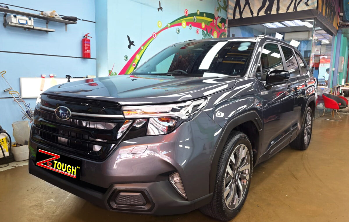 Subaru Forester, glossy after its ZeTough Titanium coating.