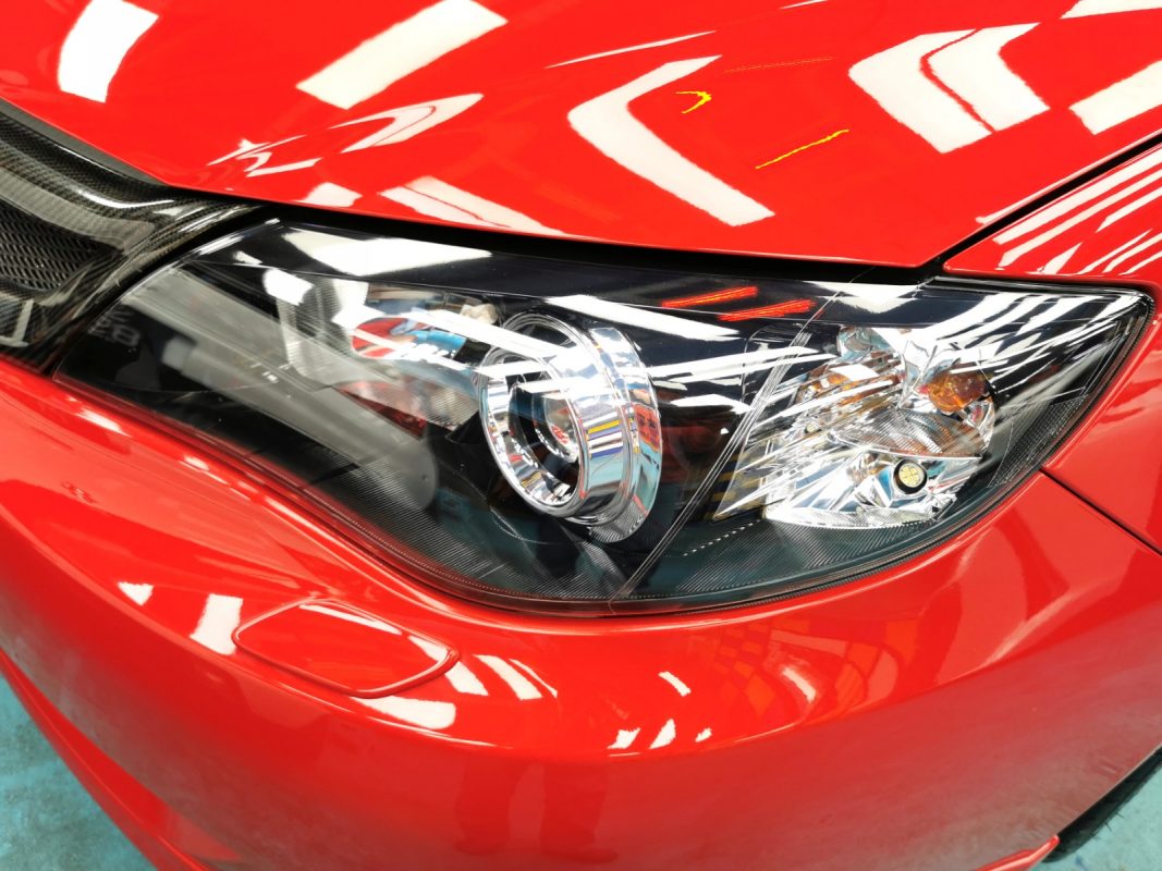 The resprayed bodywork of the Subaru Impreza.