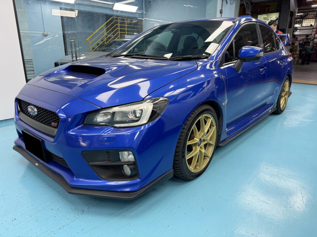 The Subaru WRX as it arrived at Revol Carz before the respray.