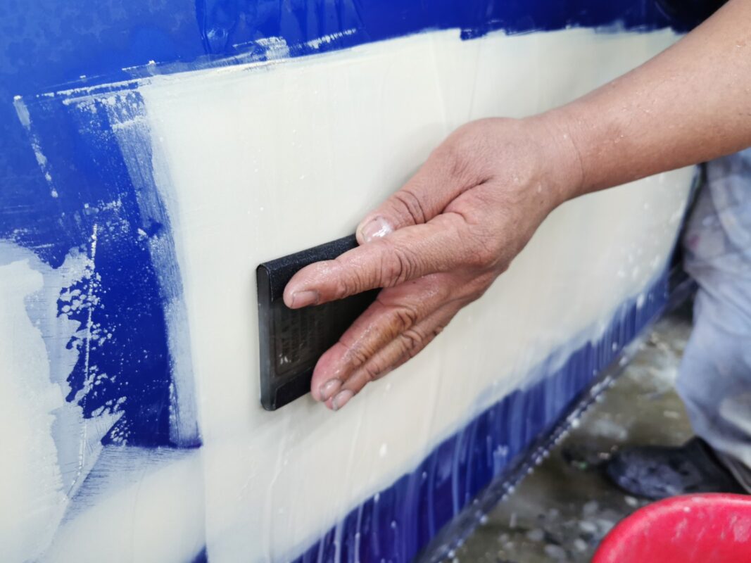 A primer coat applied to the Subaru WRX before spraying.