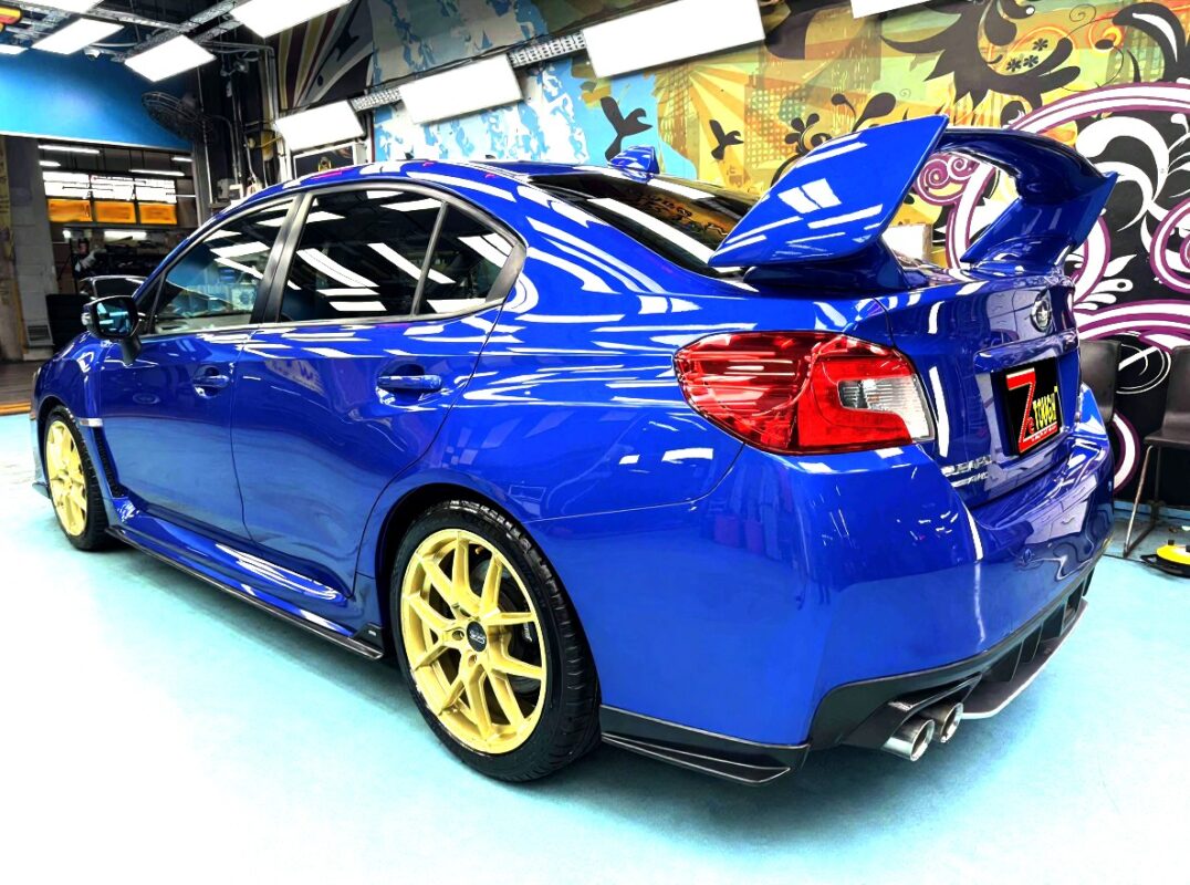 Glossy body panels on the resprayed Subaru WRX.