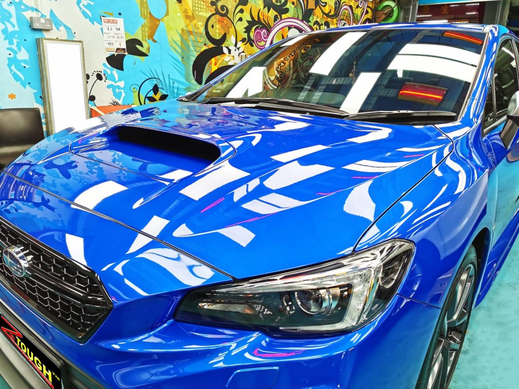 The Subaru WRX from a side angle after the ceramic coating.