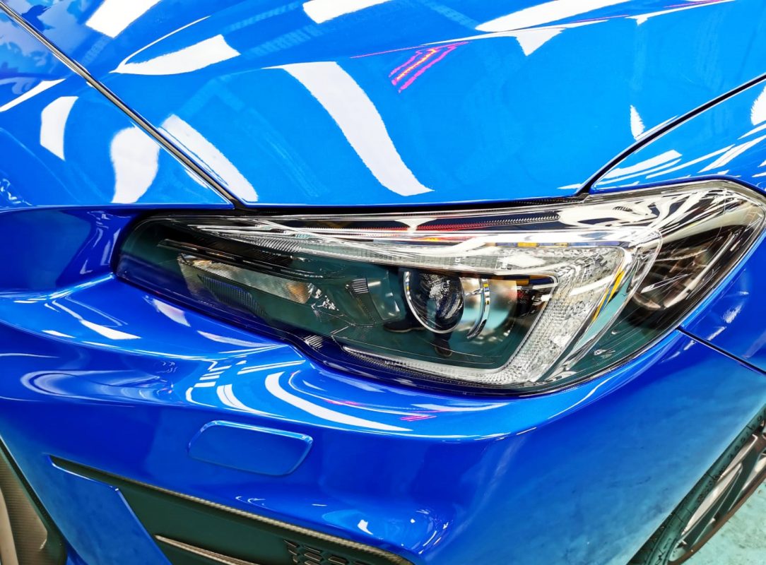 The WRX's coated paintwork showing clean reflections.