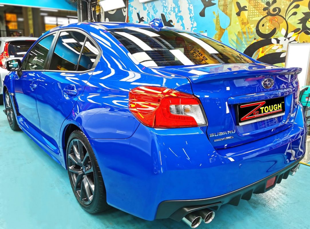 Rear quarter of the Subaru WRX, glossy and protected.
