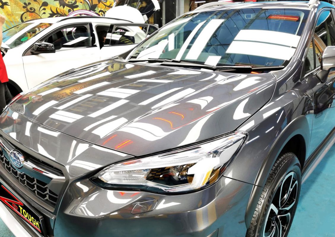 The Subaru XV from a side angle after the ceramic coating.