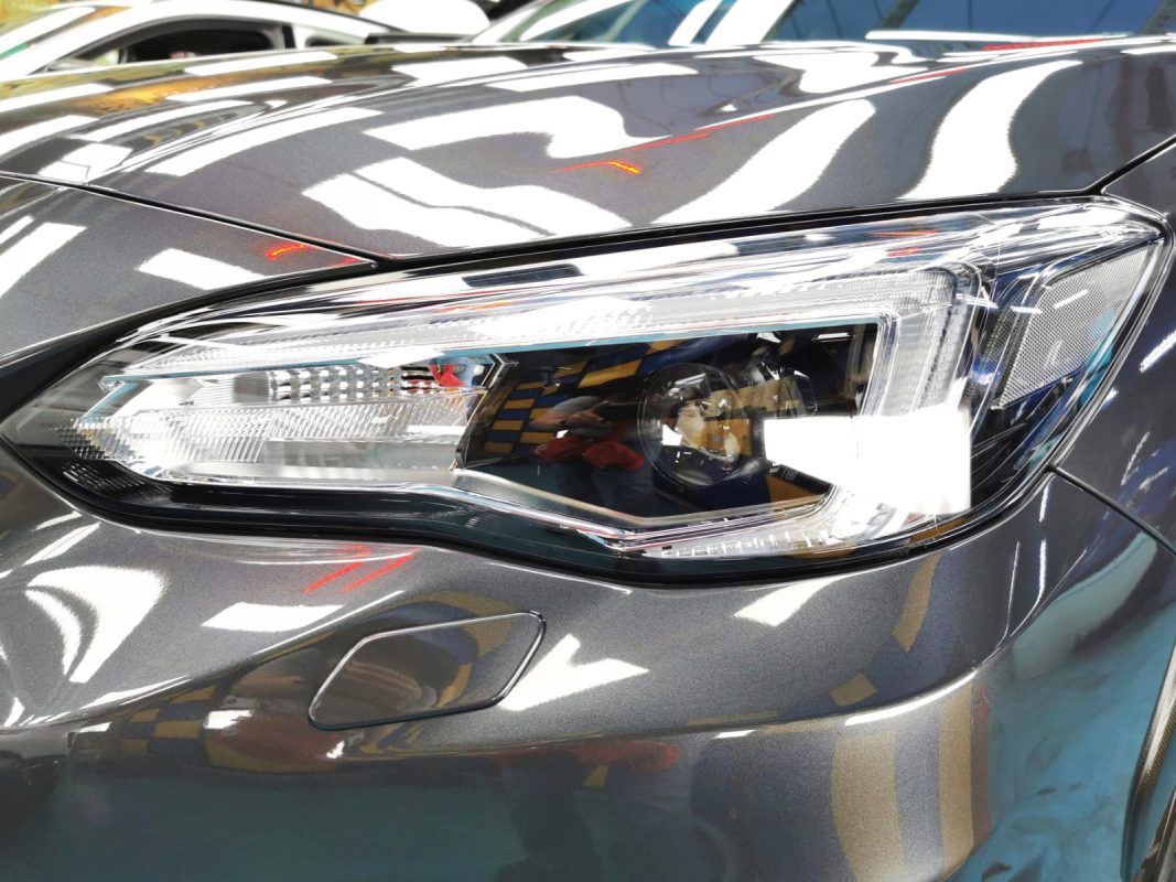 The XV's coated paintwork showing clean reflections.