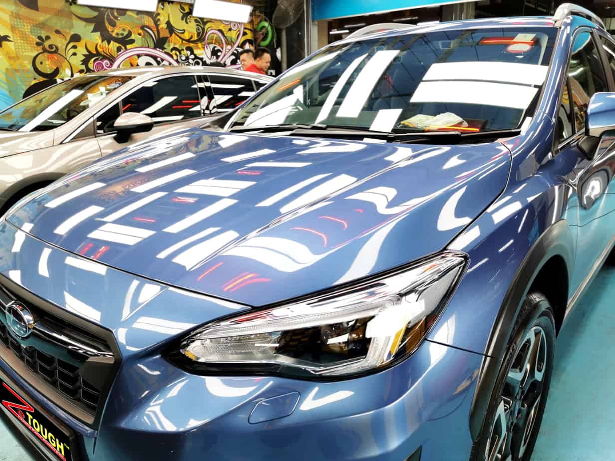 The Subaru XV from a side angle after the ceramic coating.
