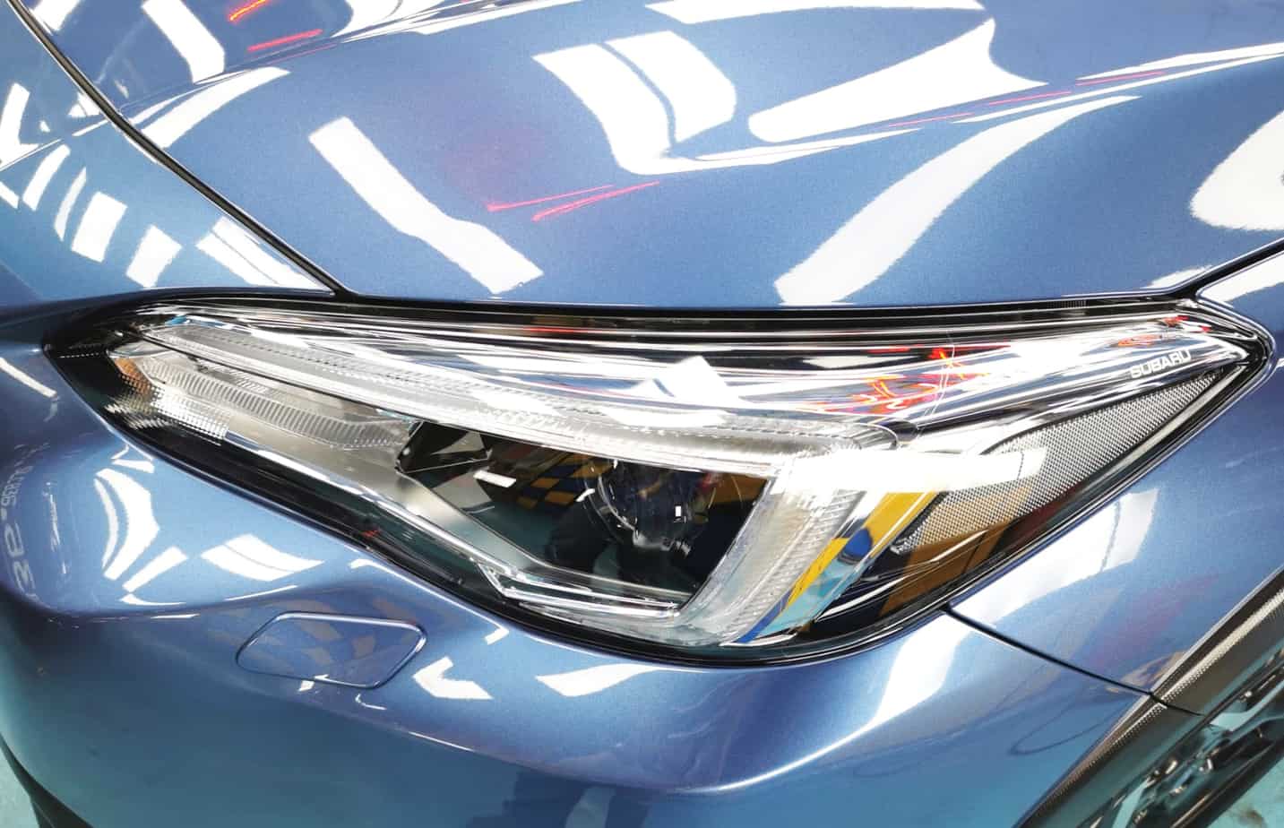 The XV's coated paintwork showing clean reflections.