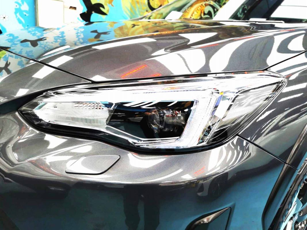 The XV's coated paintwork showing clean reflections.
