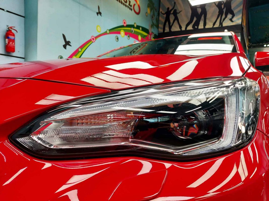 The XV's coated paintwork showing clean reflections.