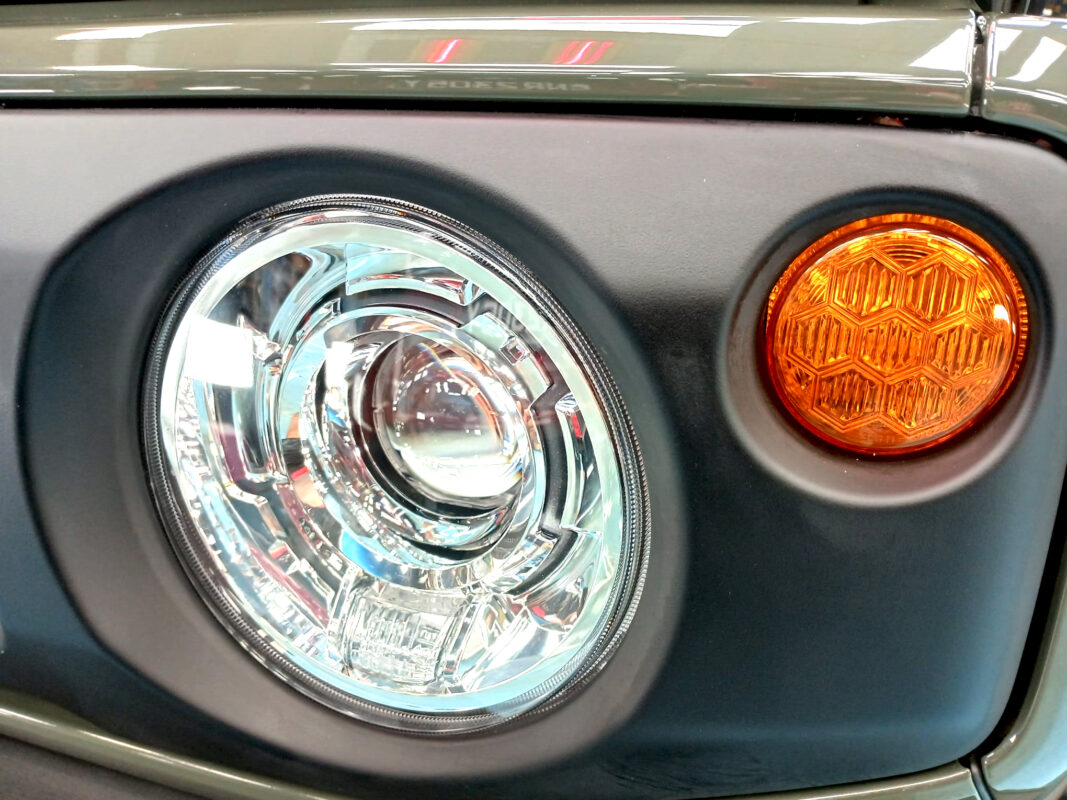 The Jimny's coated paintwork showing clean reflections.