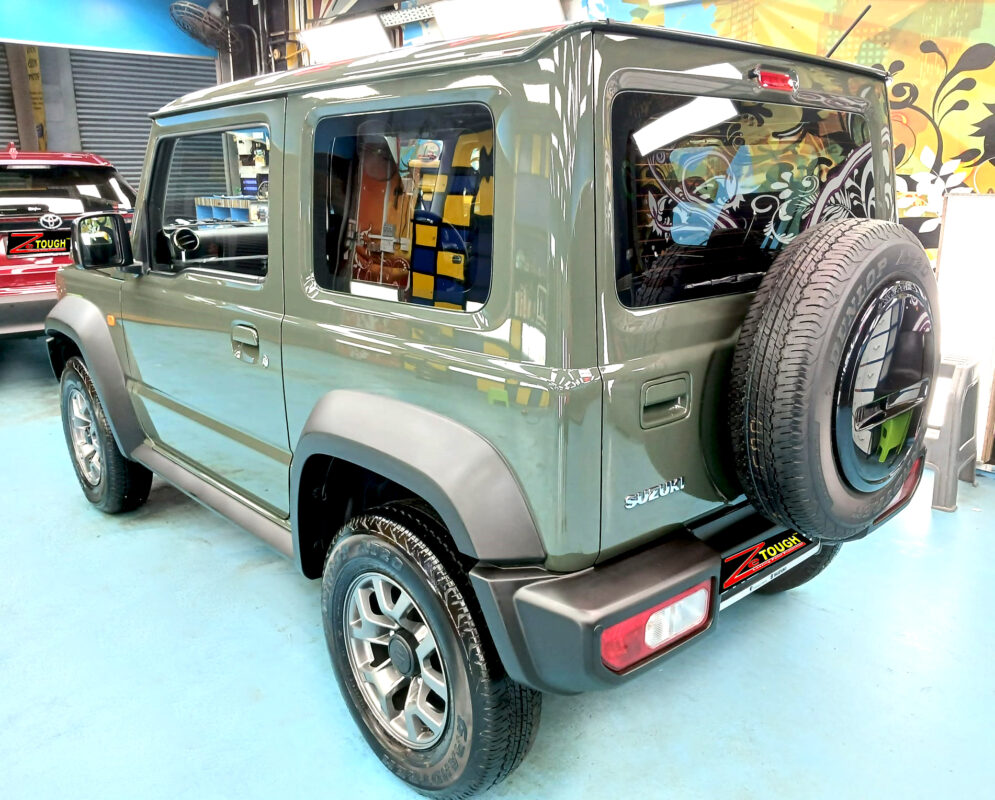 Rear quarter of the Suzuki Jimny, glossy and protected.