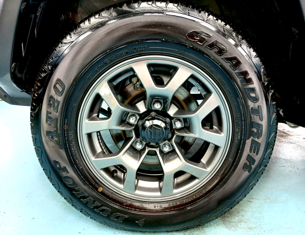 Wheel and panel edge detail on the coated Suzuki Jimny.