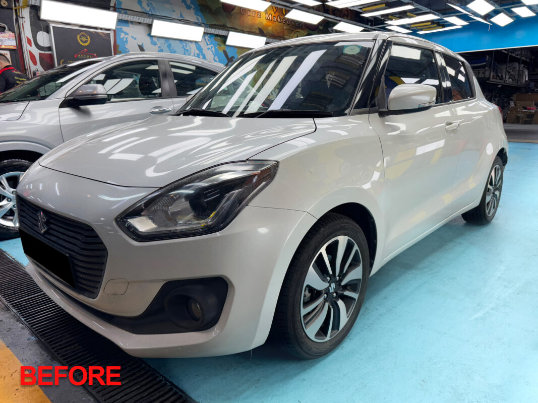 Suzuki Swift, glossy after its full respray at Revol Carz.