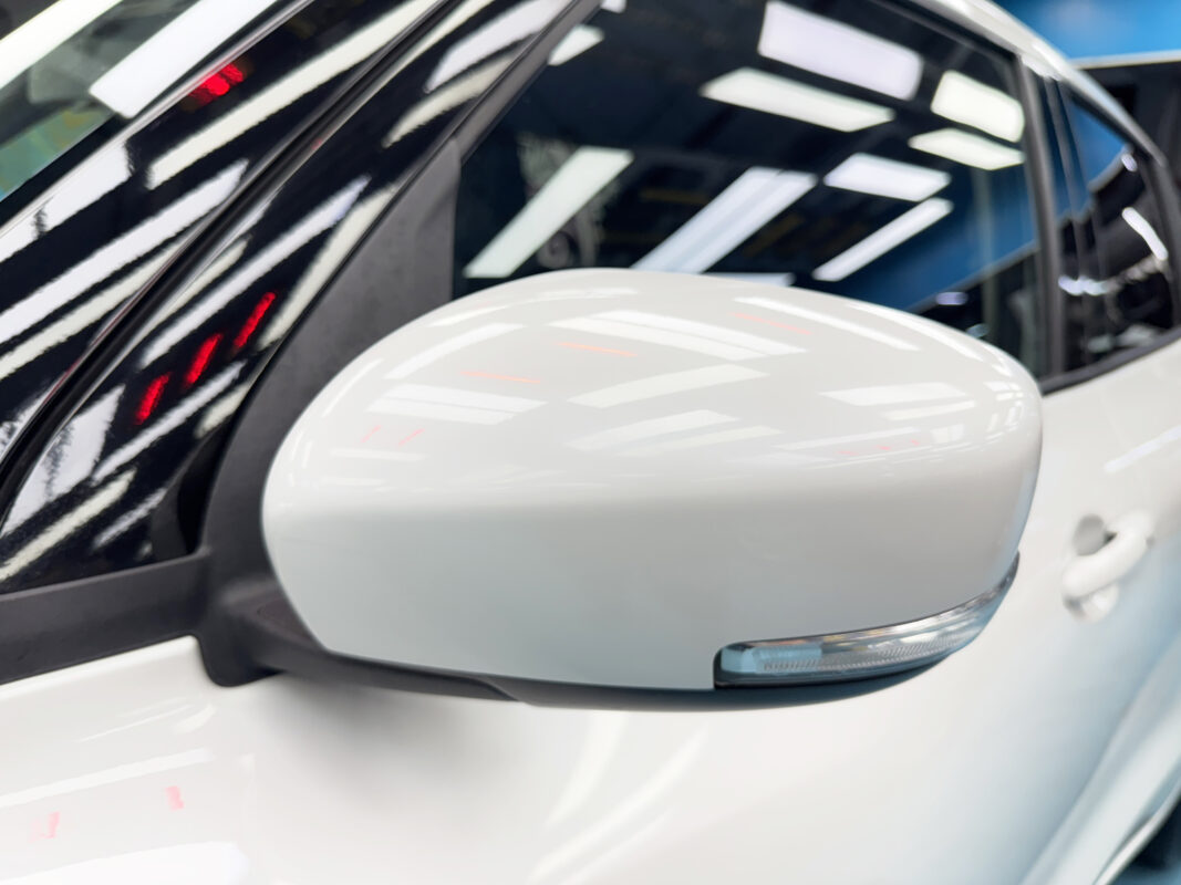 Before: the Suzuki Swift's paintwork in its original damaged condition.