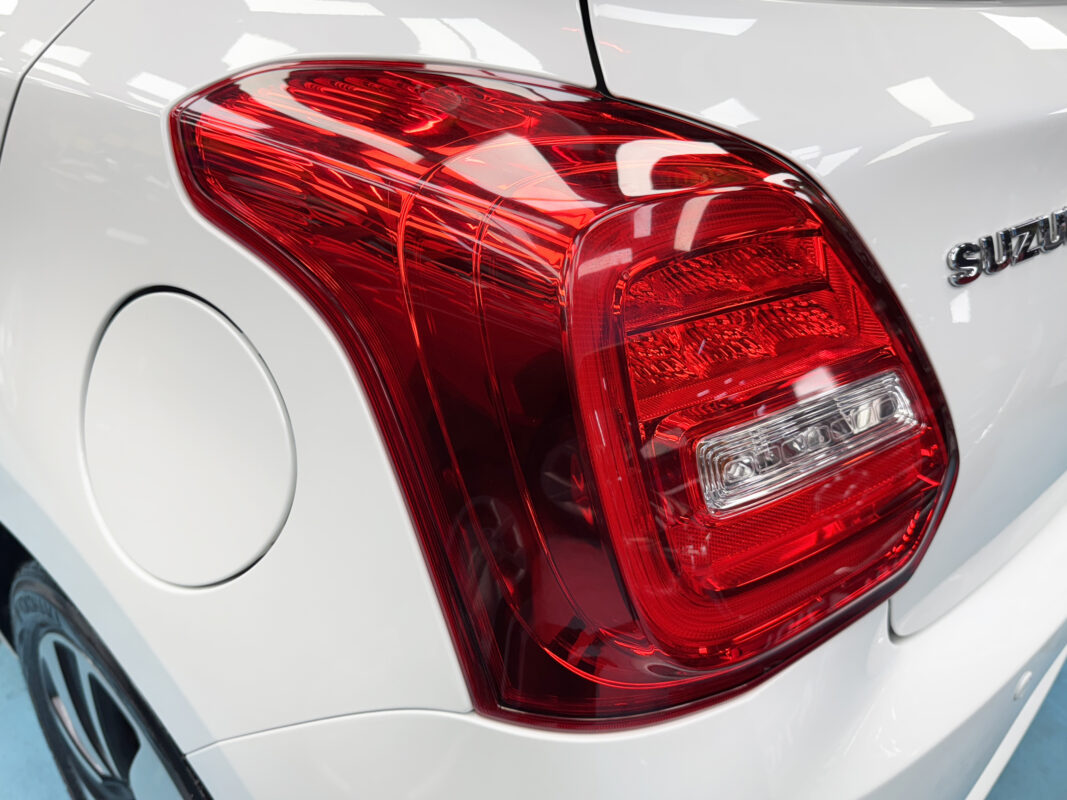After: the Suzuki Swift resprayed to a fresh, even finish.