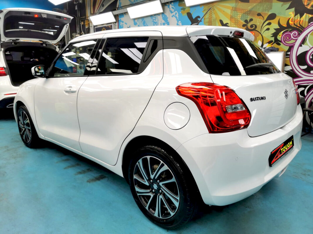 Rear quarter of the Suzuki Swift, glossy and protected.