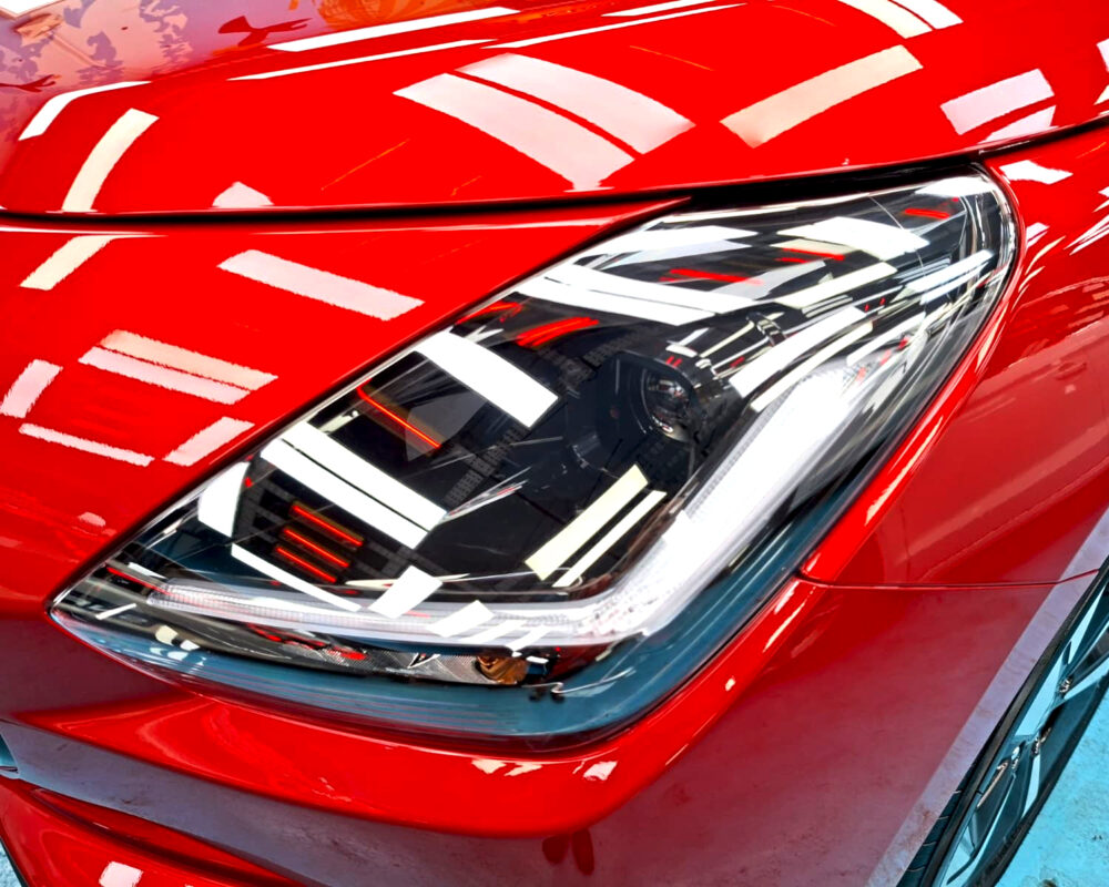 Glossy bodywork of the Suzuki Swift after coating.