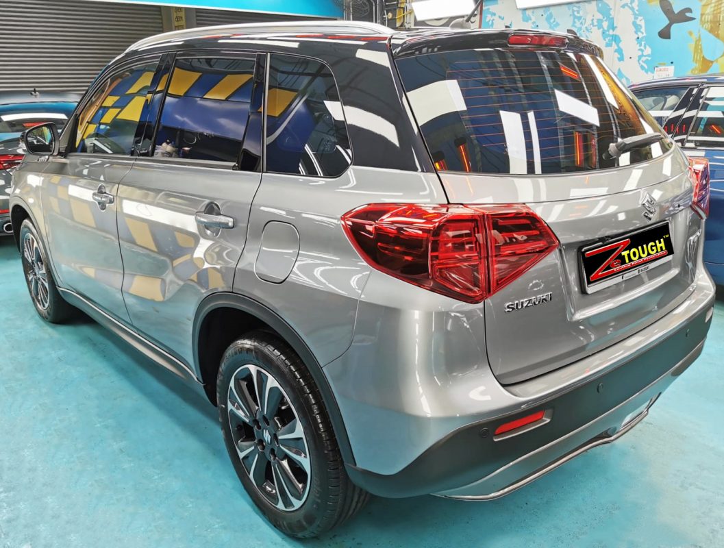 Rear quarter of the Vitara, glossy and protected.