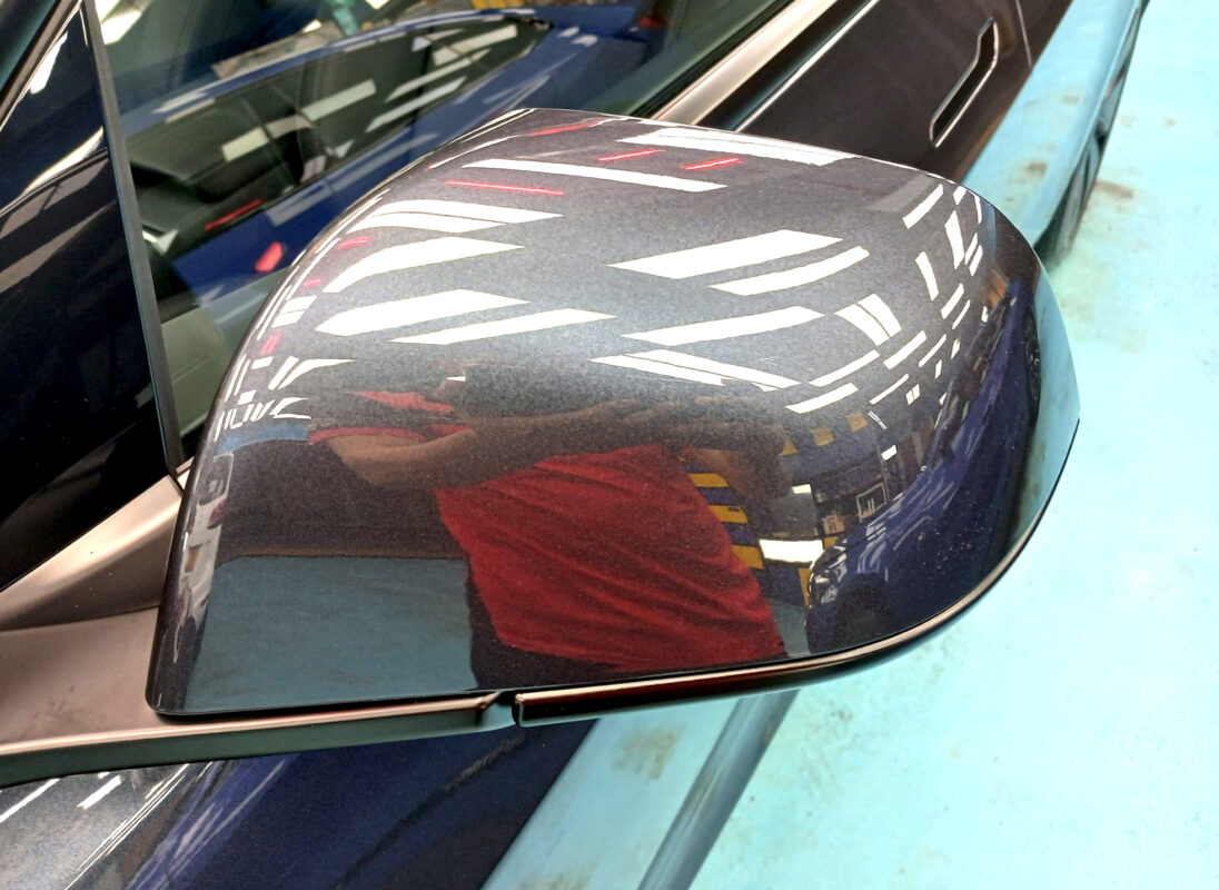 Side panel of the Tesla Model 3 with the ceramic finish locked in.