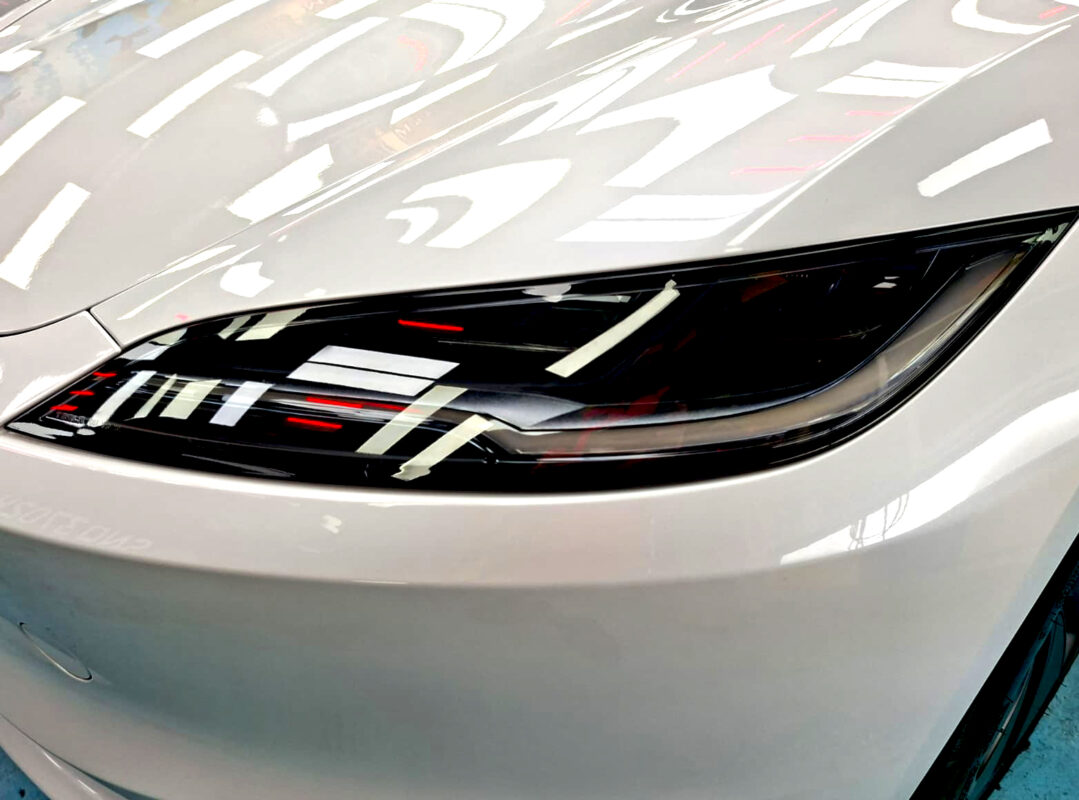 Glossy bodywork of the Tesla Model 3 after coating.