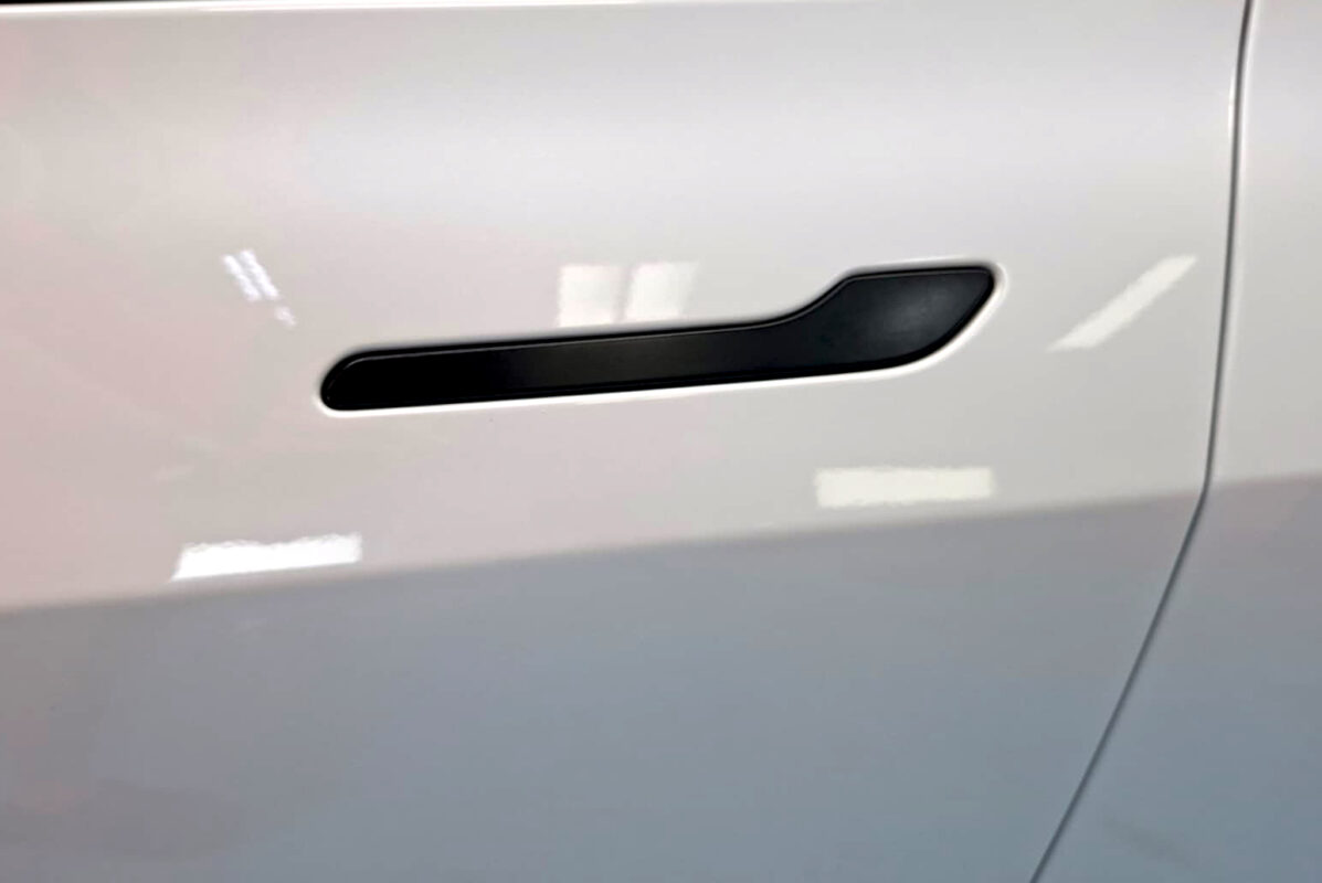 Detailed exterior of the Tesla Model 3.