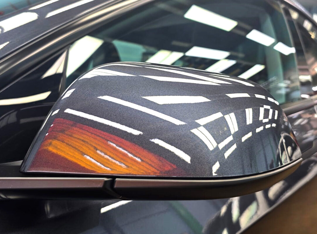 Side panel of the Tesla Model 3 with the ceramic finish locked in.