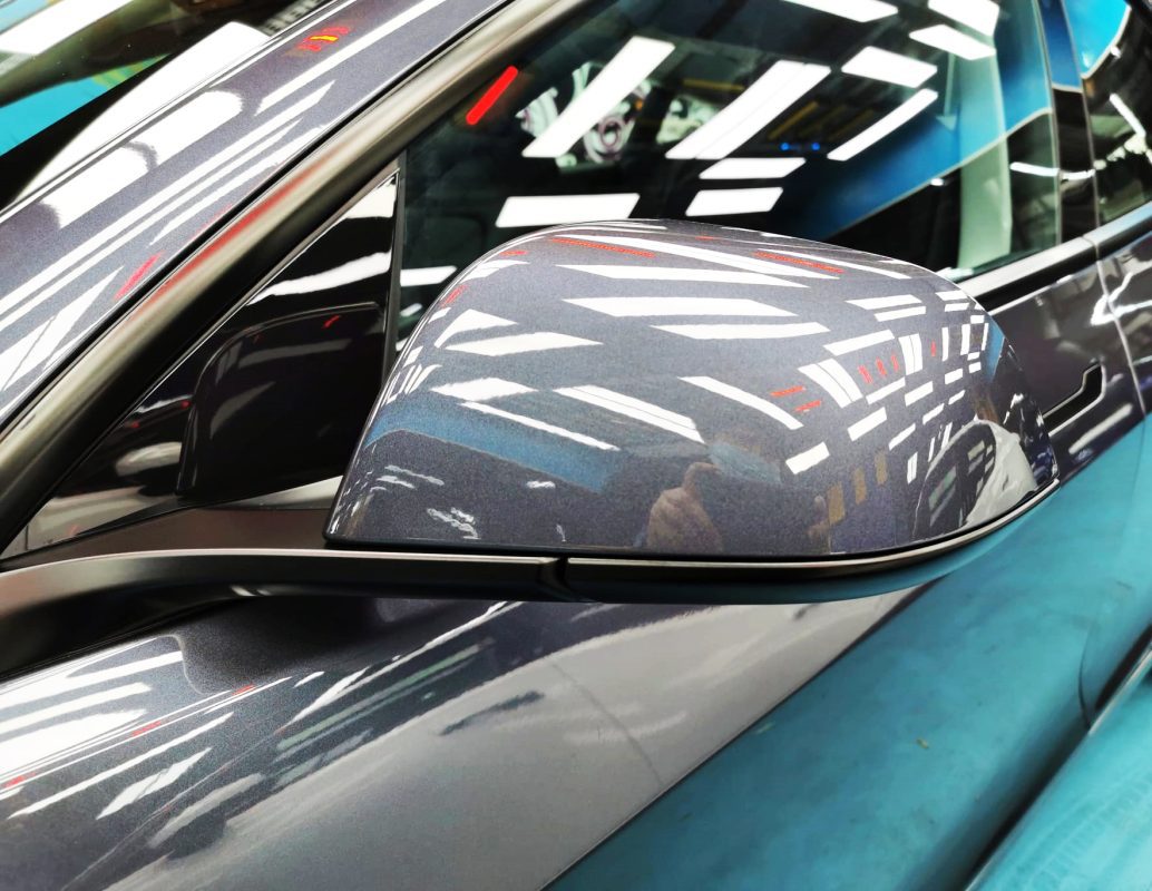 Side panel of the Model 3 with the titanium finish locked in.