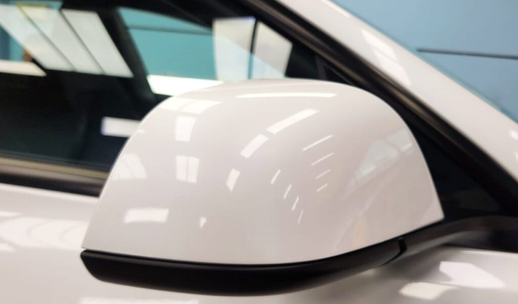 Detail of the Tesla Model 3's bodywork sealed with ZeTough Titanium.